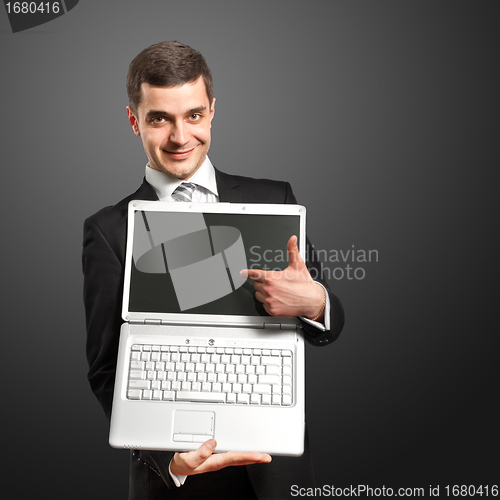 Image of Businessman With Open Laptop In His Hands