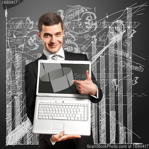 Image of Businessman With Open Laptop In His Hands