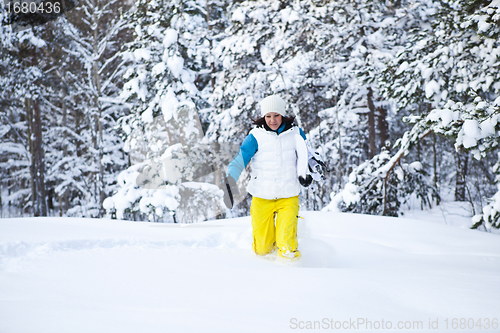 Image of Winter woman with snowboard