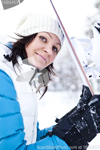 Image of Winter woman with snowboard