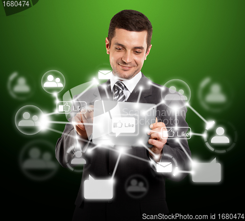 Image of Businessman With I Pad in Social Network