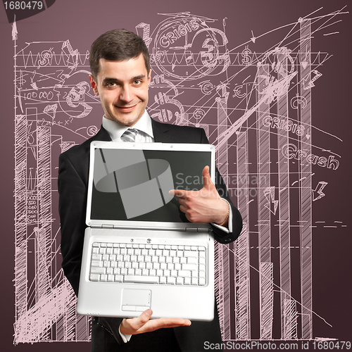 Image of Businessman With Open Laptop In His Hands