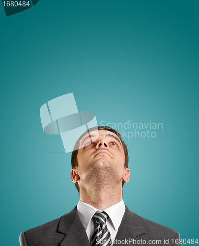 Image of Businessman Looking Upwards