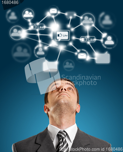 Image of Businessman Looking Upwards in Social Network