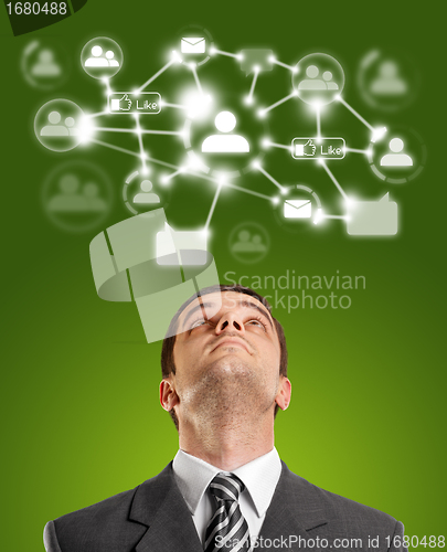 Image of Businessman Looking Upwards in Social Network