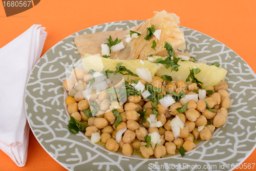 Image of codfish with potato and grain.