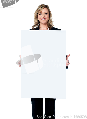 Image of Business woman showing blank signboard