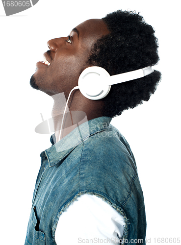 Image of A handsome young boy with headphones