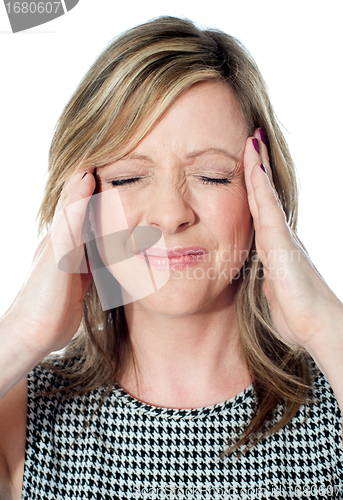 Image of Woman having a bad headache