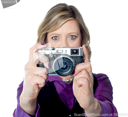 Image of Portrait of a beautiful woman with camera