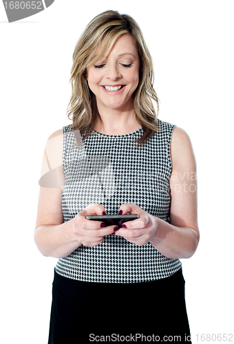 Image of Attractive lady using mobile phone