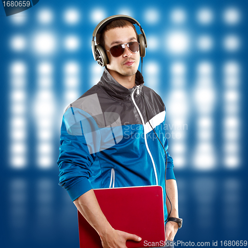 Image of Man With Headphones And Laptop