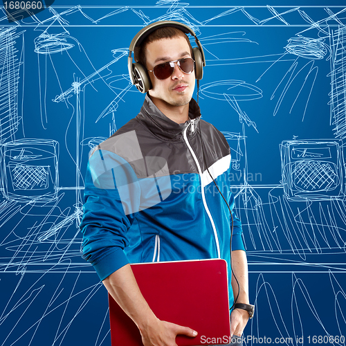 Image of Man With Headphones And Laptop