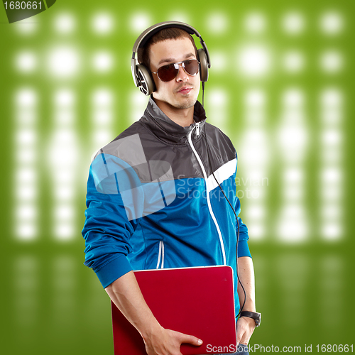 Image of Man With Headphones And Laptop