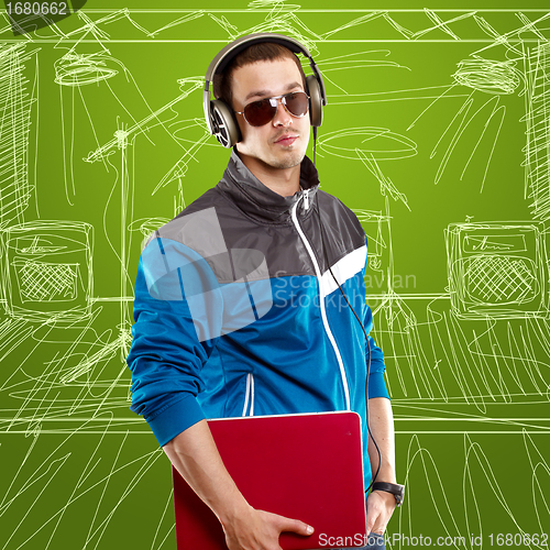 Image of Man With Headphones And Laptop