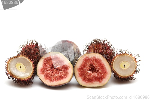 Image of exotic fruits compilation: rambutan and fig