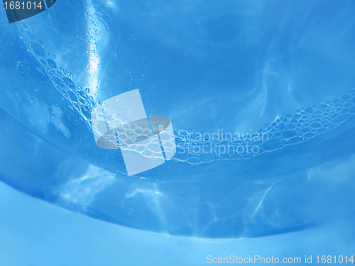 Image of blue ice, water and bubbles 