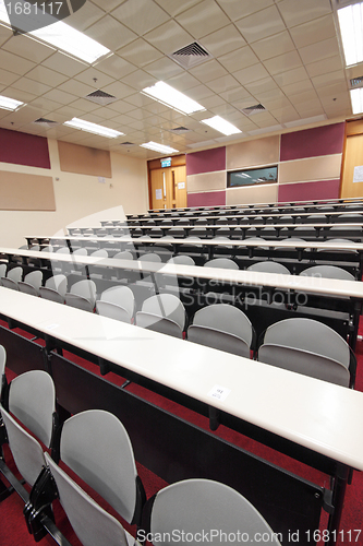 Image of Empty hall for presentation with grey armchairs 