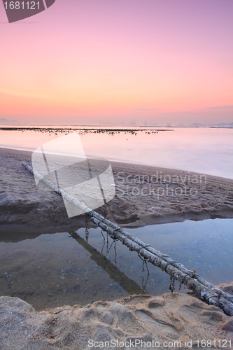 Image of Tropical sunset on the beach.