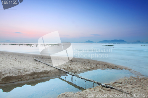 Image of Tropical sunset on the beach.