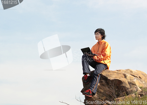 Image of asain Man with notebook 