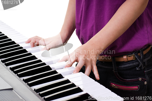 Image of close up of keyboard with hands