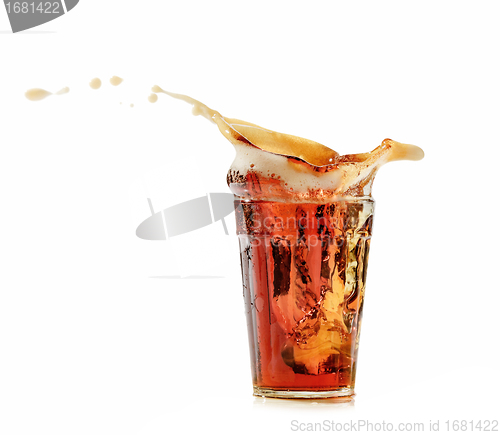 Image of cola glass and cola splashing