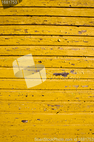 Image of ancient wooden wall with peeling paint background 