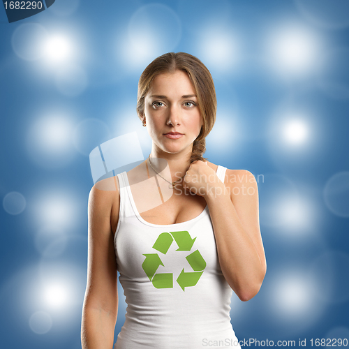 Image of Woman With Recycling Symbol Looking on Camera