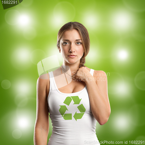 Image of Woman With Recycling Symbol Looking on Camera