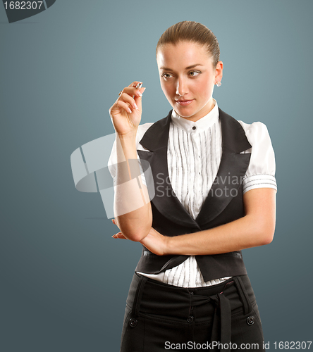 Image of businesswoman writing something