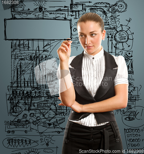 Image of businesswoman writing something