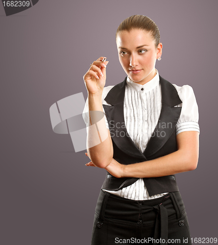 Image of businesswoman writing something