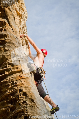 Image of male rock climber
