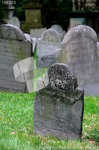 Image of Tombstones in old grave yard one