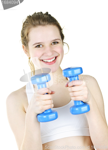 Image of Fit active girl exercising with weights