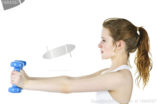 Image of Fit active girl lifting weights for fitness