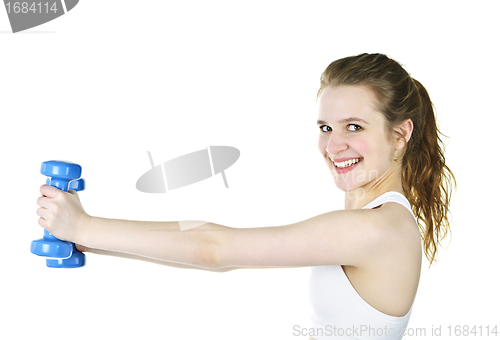 Image of Fit active girl lifting weights for fitness