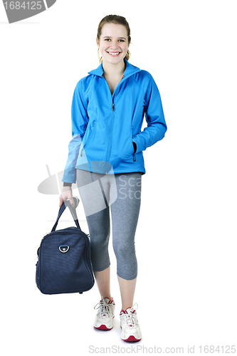 Image of Athletic girl with gym bag ready for workout