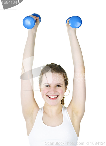 Image of Fit active girl lifting weights for fitness