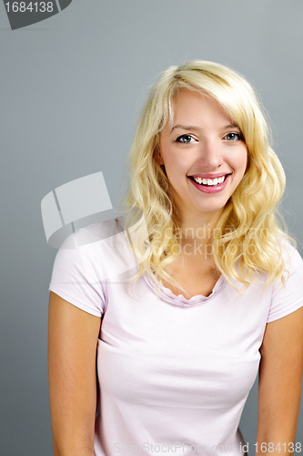 Image of Happy young woman smiling