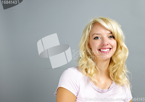 Image of Happy young woman smiling