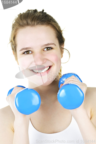 Image of Happy active girl exercising with weights