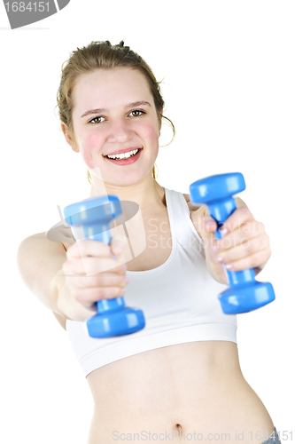 Image of Fit active girl exercising with weights