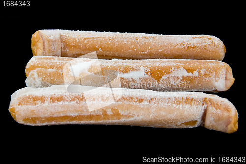 Image of Frozen hotdogs in a bunch