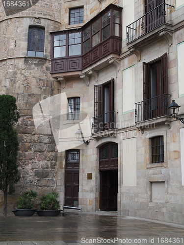 Image of Building built against the roman gate of Barcelona.