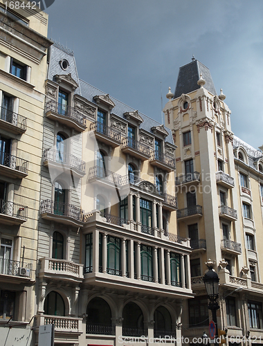 Image of Building frontage under a storm sky, Barcelona center , Spain