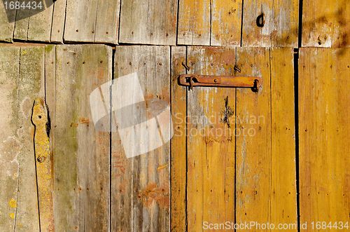 Image of Old farm building door. 