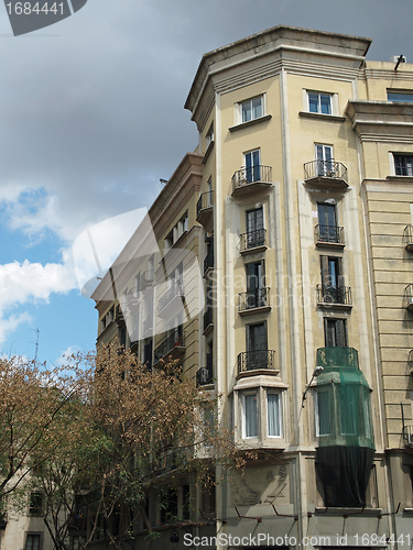 Image of Building frontage under a storm sky, Barcelona center , Spain