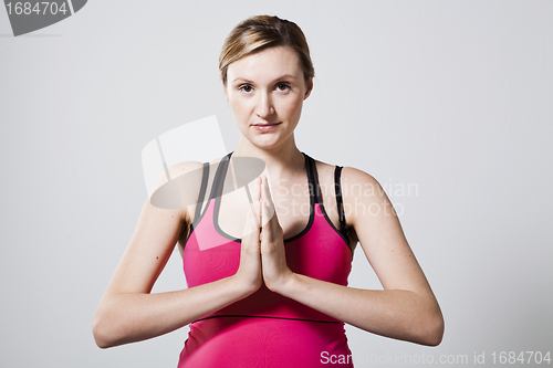 Image of Pregnant woman meditating